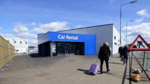 Car rental agency building and lot